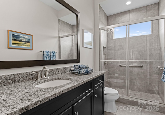 767 Pinnacle Dr, Iron Station, NC 28080 - full bath featuring vanity, tile patterned floors, a stall shower, and toilet