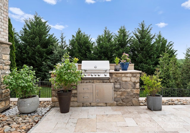 767 Pinnacle Dr, Iron Station, NC 28080 - view of patio featuring fence, a grill, and area for grilling