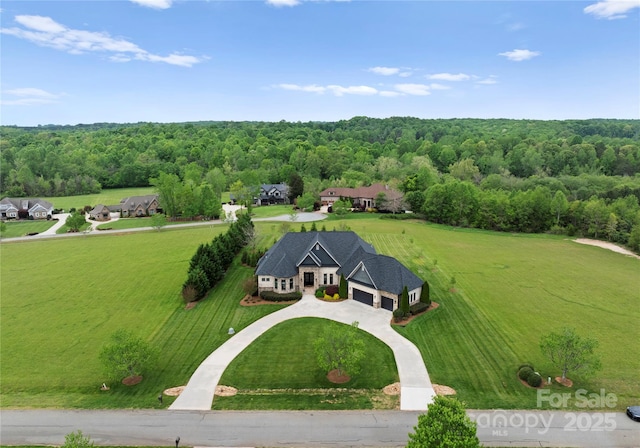 767 Pinnacle Dr, Iron Station, NC 28080 - birds eye view of property with a wooded view