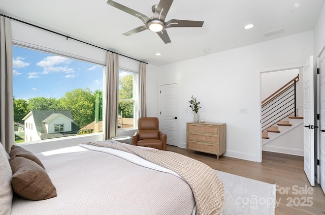 bedroom with recessed lighting, baseboards, ceiling fan, and wood finished floors