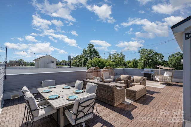 view of patio with fence, an outdoor living space, and outdoor dining area