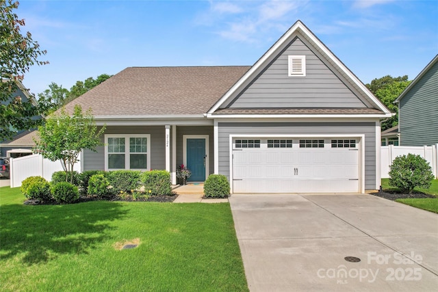 2124 Katie Alice Cir, Waxhaw, NC 28173 - view of front of property with concrete driveway, an attached garage, and a shingled roof