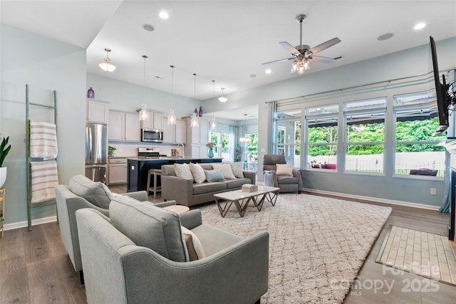 2124 Katie Alice Cir, Waxhaw, NC 28173 - living room featuring dark wood-style flooring, ceiling fan, and recessed lighting