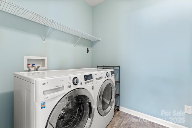 2124 Katie Alice Cir, Waxhaw, NC 28173 - laundry room with independent washer and dryer and baseboards