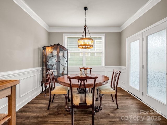 775 Summerfield Pl, Flat Rock, NC 28731 - dining space featuring dark wood finished floors, crown molding, a notable chandelier, and wainscoting