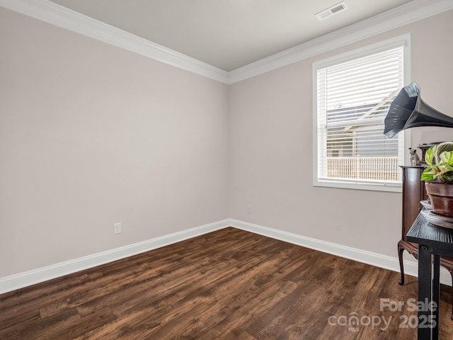 775 Summerfield Pl, Flat Rock, NC 28731 - unfurnished room with baseboards, visible vents, dark wood-style floors, and crown molding