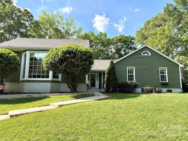 5916 Rexwood Pl, Charlotte, NC 28210 - ranch-style house featuring brick siding, a shingled roof, and a front yard
