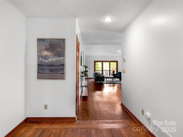 3 Governors Dr, Asheville, NC 28804 - hall with crown molding, visible vents, wood finished floors, baseboards, and a textured ceiling