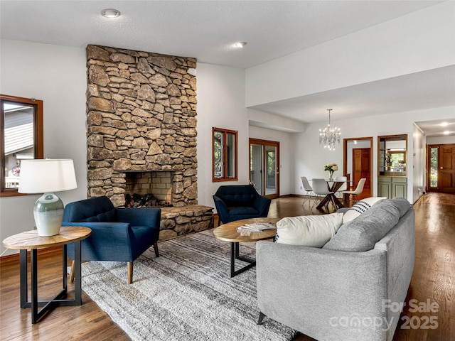 3 Governors Dr, Asheville, NC 28804 - living room with baseboards, a notable chandelier, and wood finished floors