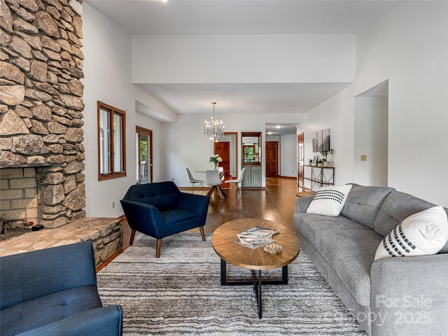 3 Governors Dr, Asheville, NC 28804 - living area with wood finished floors, a chandelier, and high vaulted ceiling
