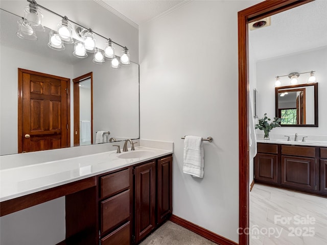 3 Governors Dr, Asheville, NC 28804 - bathroom featuring crown molding, vanity, and baseboards