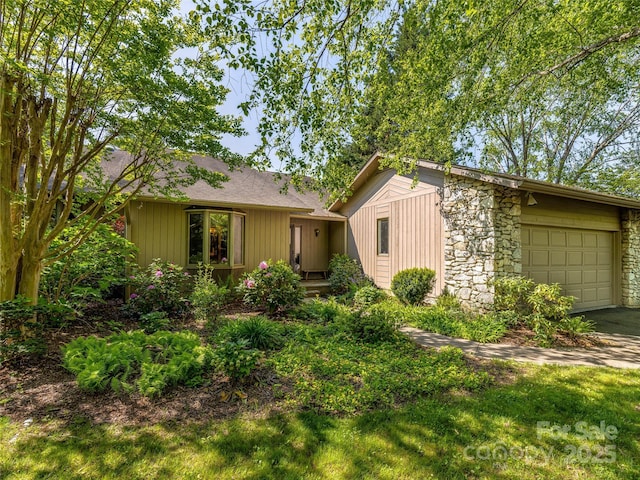 3 Governors Dr, Asheville, NC 28804 - view of front of house featuring a garage, driveway, and stone siding