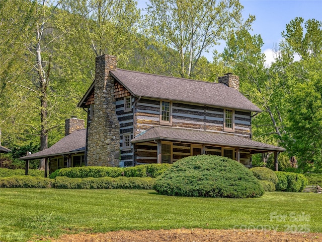 3 Governors Dr, Asheville, NC 28804 - log home featuring a shingled roof, a front yard, and a chimney