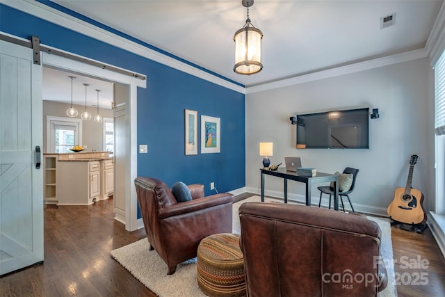 7409 Gilderstern Glen Ct, Huntersville, NC 28078 - living room with crown molding, a barn door, baseboards, dark wood-type flooring, and visible vents