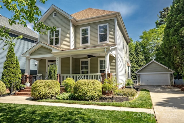 7409 Gilderstern Glen Ct, Huntersville, NC 28078 - traditional-style home featuring an outdoor structure, a garage, ceiling fan, and covered porch