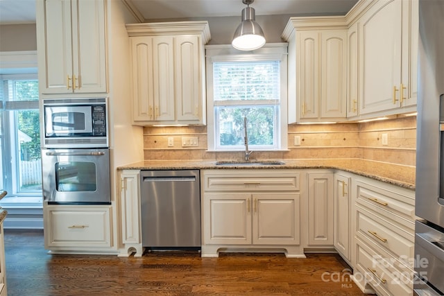 7409 Gilderstern Glen Ct, Huntersville, NC 28078 - kitchen with dark wood-style flooring, stainless steel appliances, and tasteful backsplash