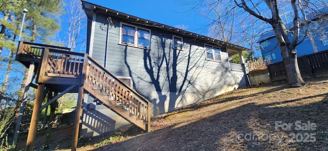 49 Euclid Blvd, Asheville, NC 28806 - view of home's exterior featuring a wooden deck, stairway, and fence