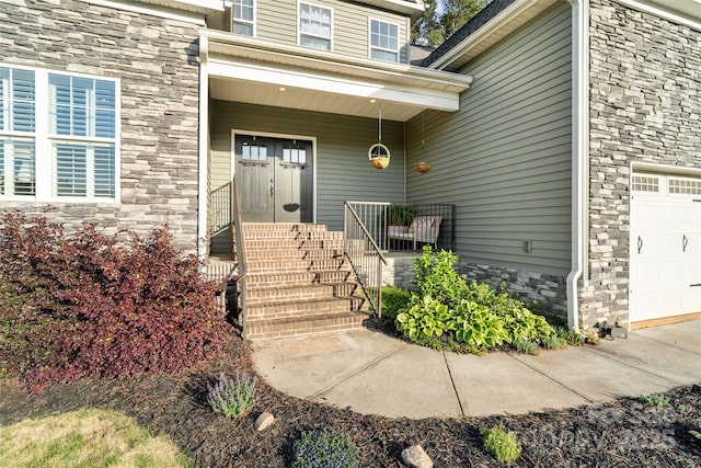property entrance with stone siding