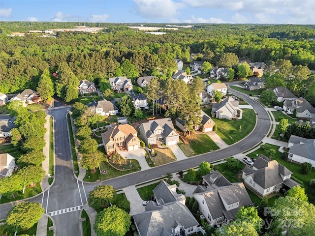 bird's eye view with a view of trees and a residential view