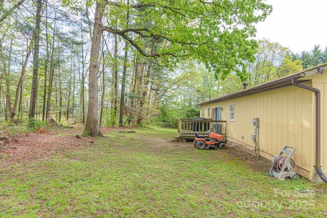 view of yard featuring a deck