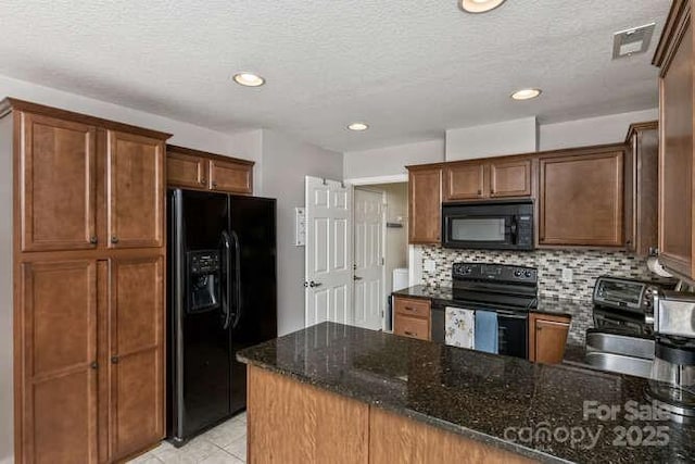43 Sunny Meadows Blvd, Arden, NC 28704 - kitchen featuring black appliances, dark stone countertops, backsplash, a peninsula, and recessed lighting