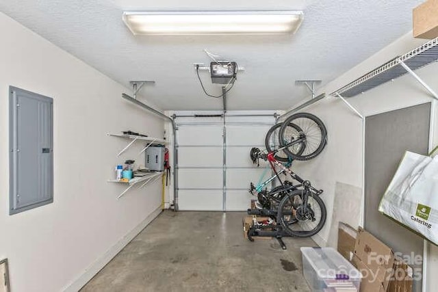 43 Sunny Meadows Blvd, Arden, NC 28704 - garage featuring electric panel, a garage door opener, and baseboards