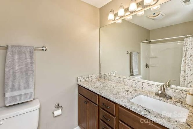 43 Sunny Meadows Blvd, Arden, NC 28704 - full bath with toilet, vanity, curtained shower, and baseboards