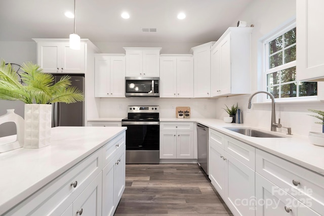 601 Westway Dr, Gastonia, NC 28054 - kitchen with recessed lighting, visible vents, a sink, white cabinetry, and appliances with stainless steel finishes