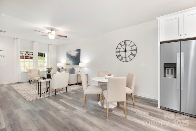 601 Westway Dr, Gastonia, NC 28054 - dining room featuring light wood finished floors, baseboards, and a ceiling fan