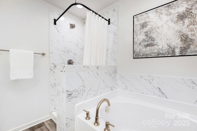 601 Westway Dr, Gastonia, NC 28054 - bathroom featuring a garden tub, wood finished floors, and curtained shower