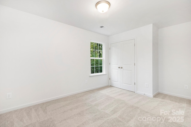 601 Westway Dr, Gastonia, NC 28054 - unfurnished room with light colored carpet, baseboards, and visible vents