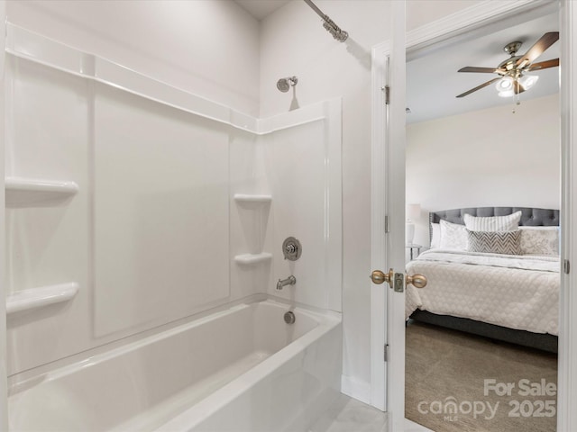 ensuite bathroom with ensuite bathroom, shower / bathtub combination, and a ceiling fan
