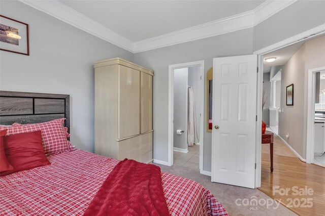 5775 Monticello Dr NW, Concord, NC 28027 - bedroom featuring baseboards, ornamental molding, and carpet floors