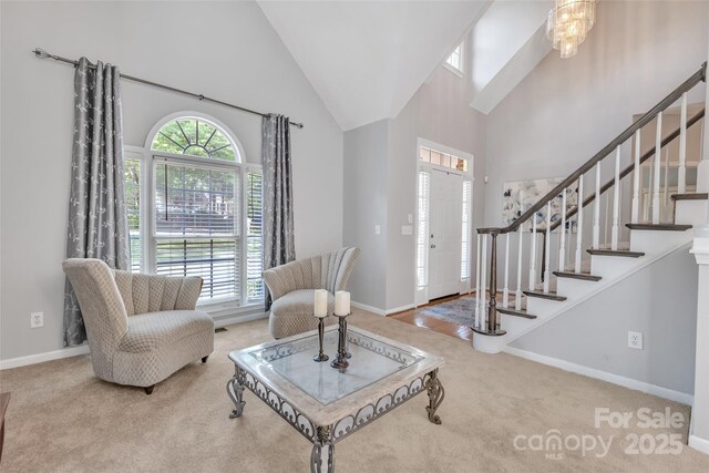 5775 Monticello Dr NW, Concord, NC 28027 - interior space with high vaulted ceiling, baseboards, and stairway