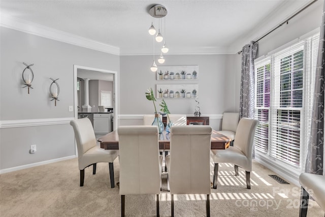 5775 Monticello Dr NW, Concord, NC 28027 - dining space with visible vents, carpet flooring, and ornamental molding