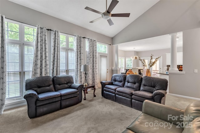 5775 Monticello Dr NW, Concord, NC 28027 - living room featuring ornate columns, a ceiling fan, light carpet, and high vaulted ceiling