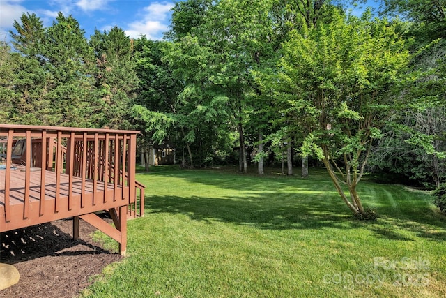 5775 Monticello Dr NW, Concord, NC 28027 - view of yard featuring a deck
