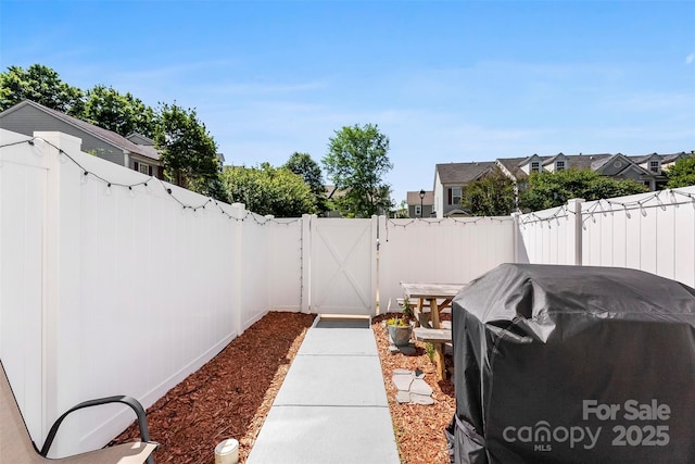 8814 Gerren Ct, Charlotte, NC 28217 - view of yard with a gate, a fenced backyard, and a residential view