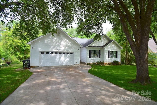 ranch-style home with a front lawn, driveway, and a garage
