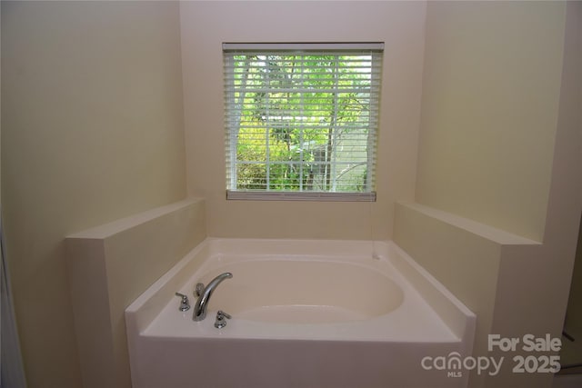 full bath featuring a bath