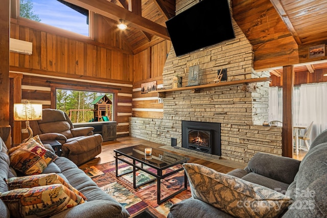 living area featuring high vaulted ceiling, wooden ceiling, hardwood / wood-style flooring, and wooden walls