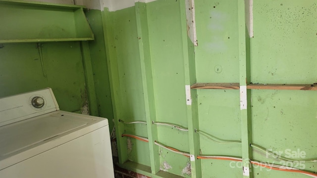 laundry room featuring laundry area and washer / clothes dryer