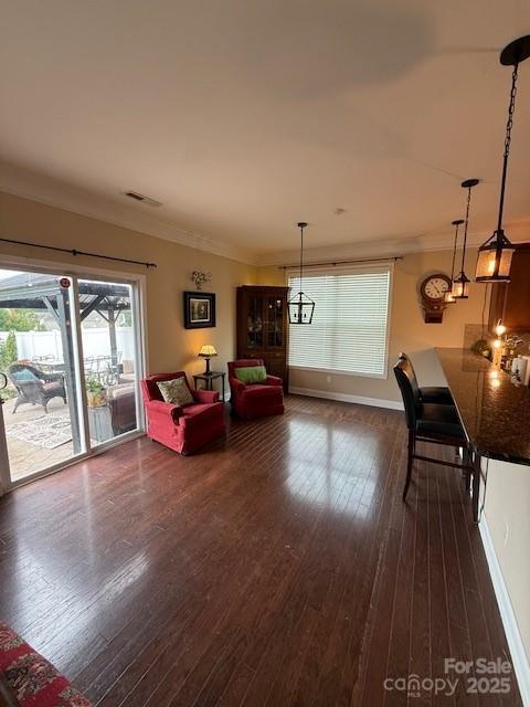 79044 Ridgehaven Rd, Lancaster, SC 29720 - living area with ornamental molding, dark wood-style floors, and baseboards