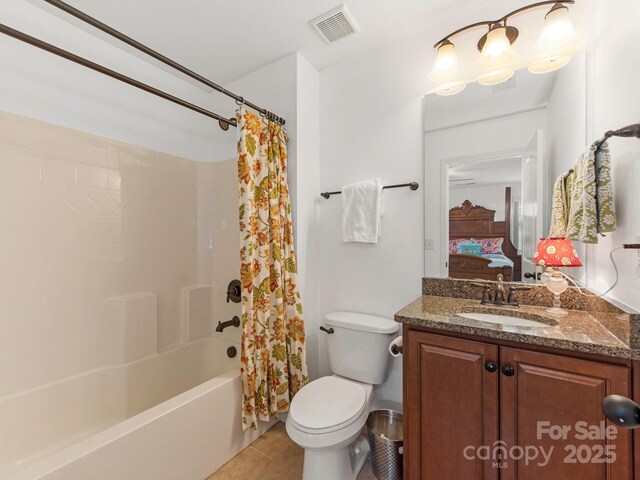 79044 Ridgehaven Rd, Lancaster, SC 29720 - bathroom with tile patterned flooring, shower / bath combo with shower curtain, vanity, ensuite bathroom, and toilet
