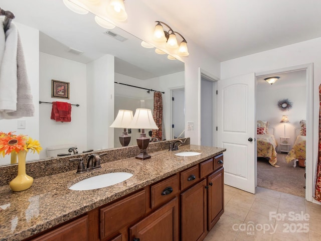 79044 Ridgehaven Rd, Lancaster, SC 29720 - ensuite bathroom featuring double vanity, tile patterned flooring, toilet, and curtained shower