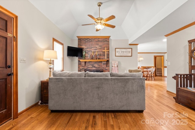 10139 Arlington Church Rd, Mint Hill, NC 28227 - living room with light wood-type flooring, vaulted ceiling, baseboards, and ceiling fan