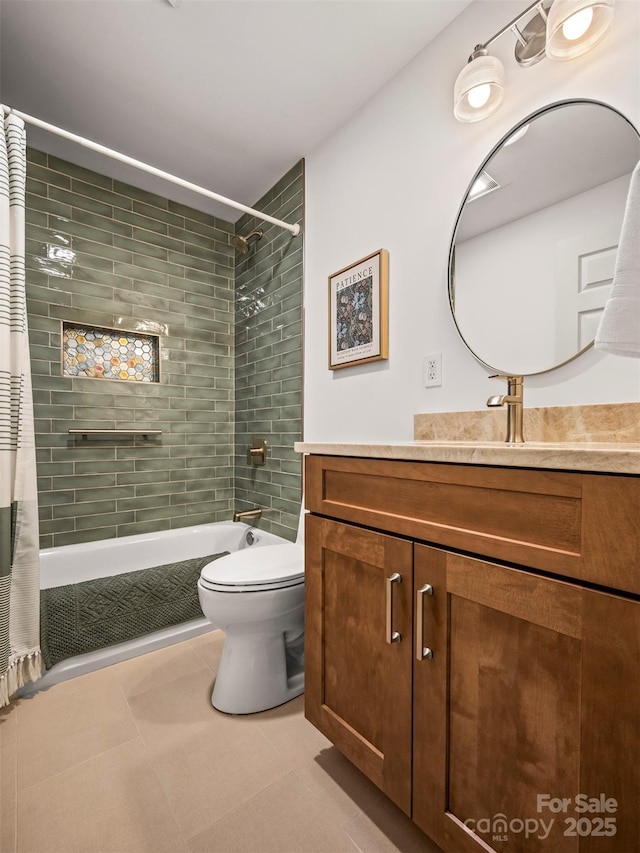 bathroom featuring toilet, vanity, and tiled shower / bath