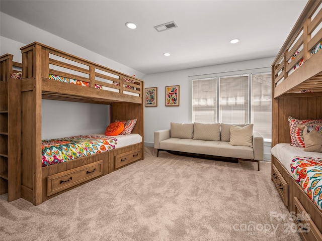 carpeted bedroom featuring recessed lighting and visible vents