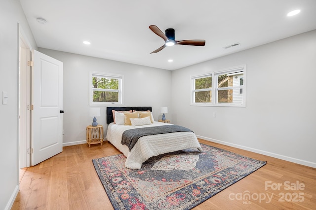 16 Graystone Rd, Asheville, NC 28804 - bedroom with baseboards, visible vents, multiple windows, and light wood-style floors