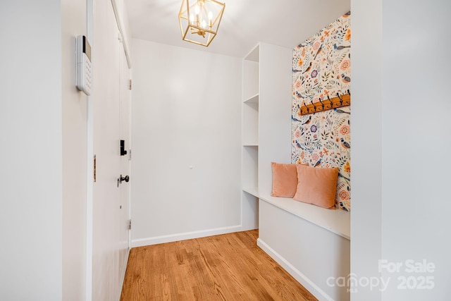 16 Graystone Rd, Asheville, NC 28804 - hall with baseboards, an inviting chandelier, and light wood-style floors
